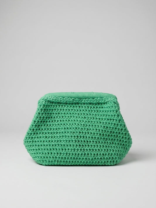 Hand-stitched green yarn into an elegant clutch.